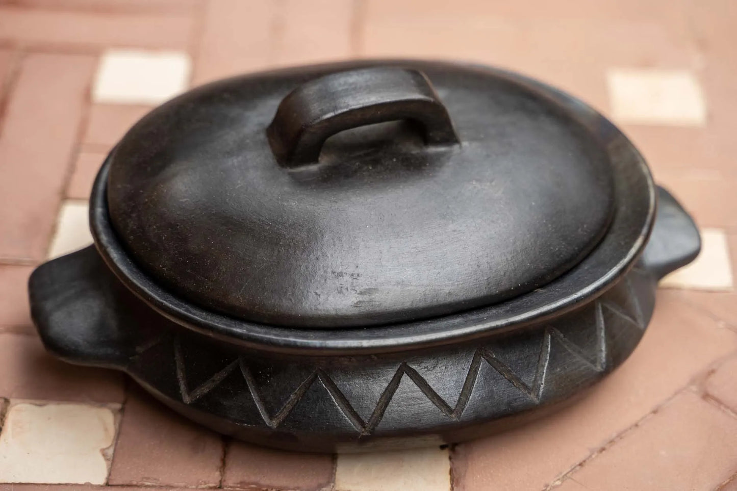 The Burnt Oval Pot with Pattern and Side Handles - Black