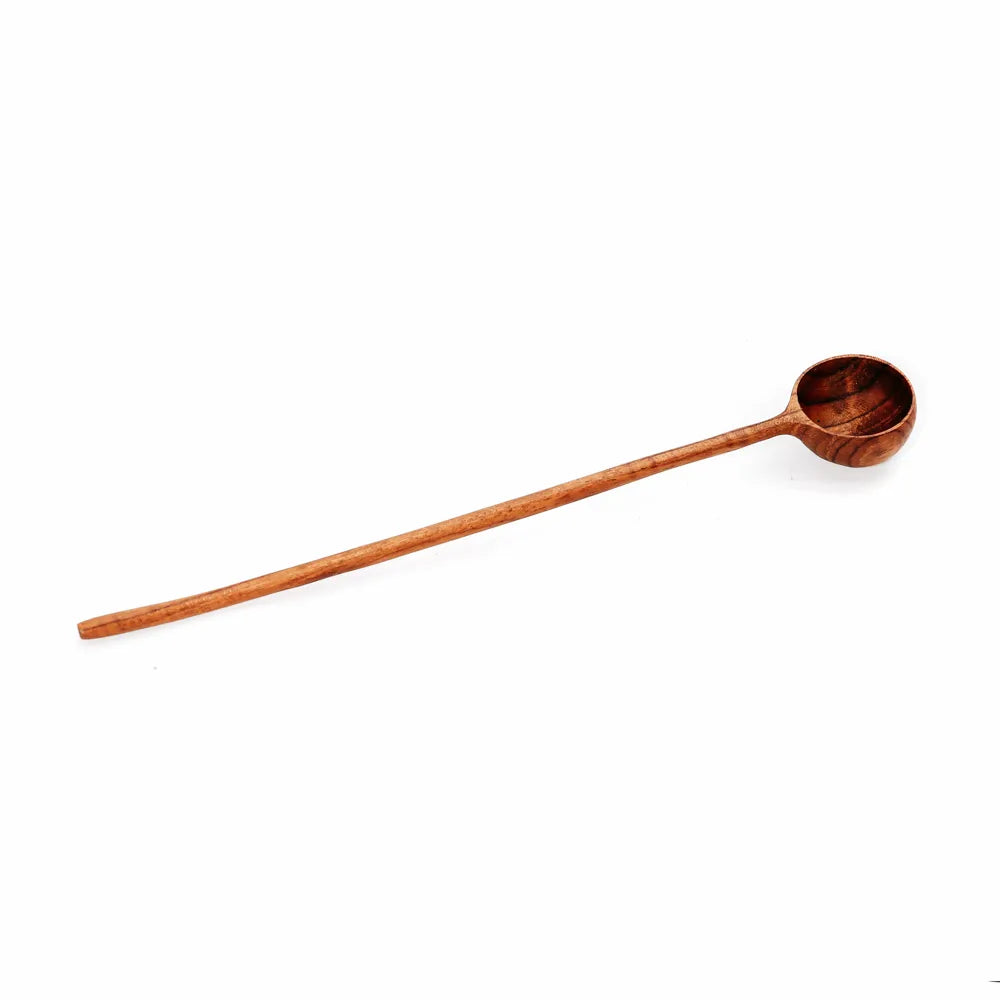La cuillère doseuse de racine de teck