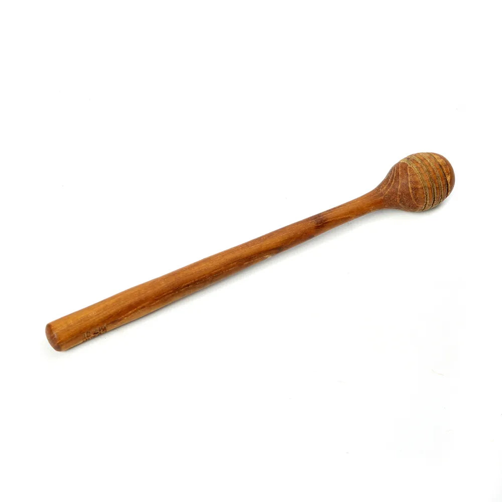 Le rouleau à miel de racine de teck