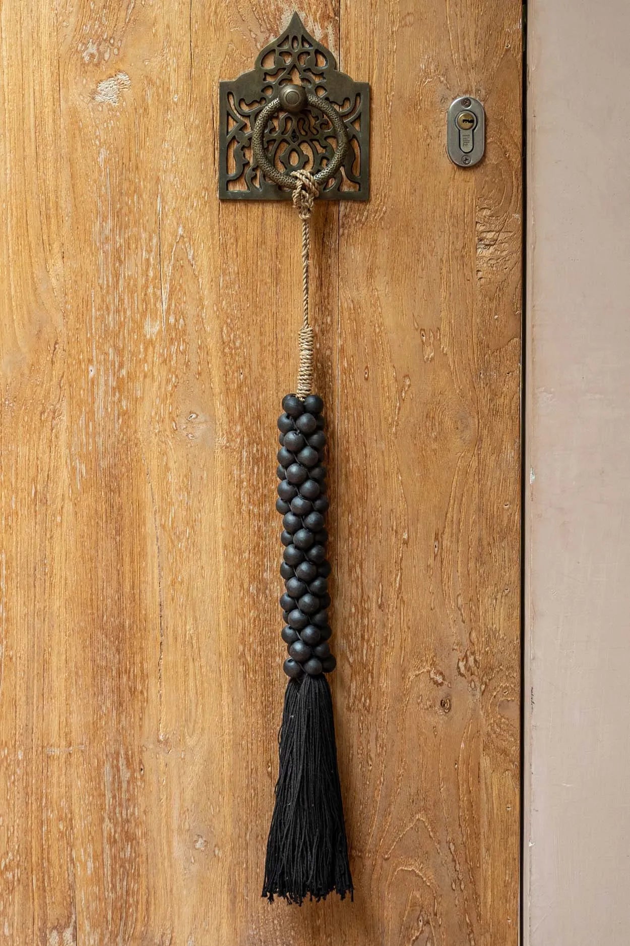 Perles en bois avec pompon en coton - Noir 2 pièces