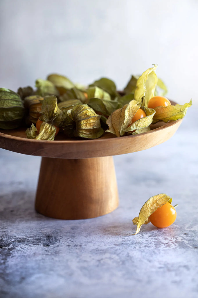 Le plat à gâteau en racine de teck - S