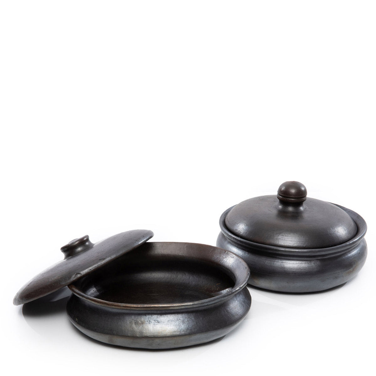 De verbrande curry-pot - zwart